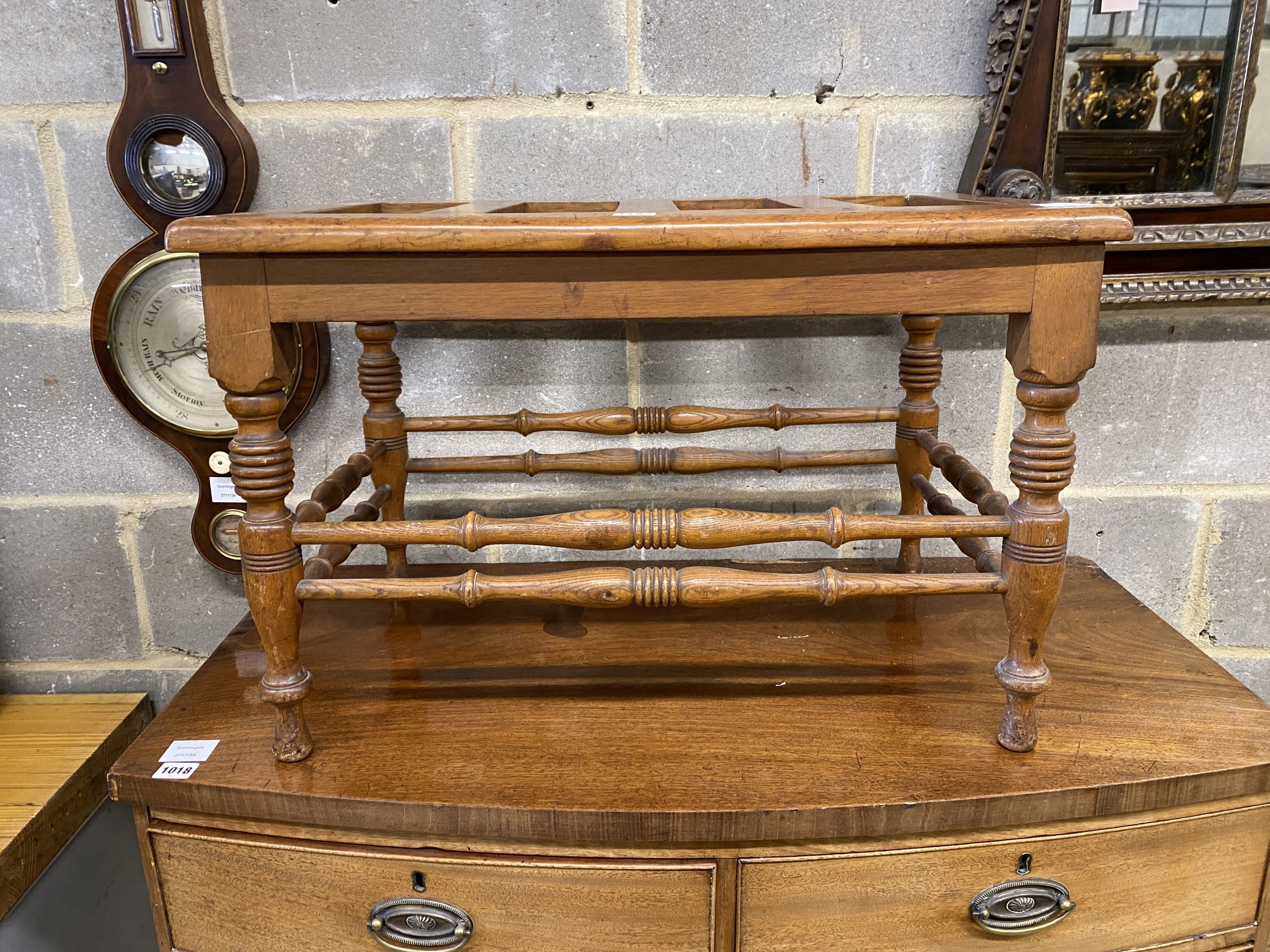 A Victorian oak luggage stand, width 69cm, depth 43cm, height 46cm